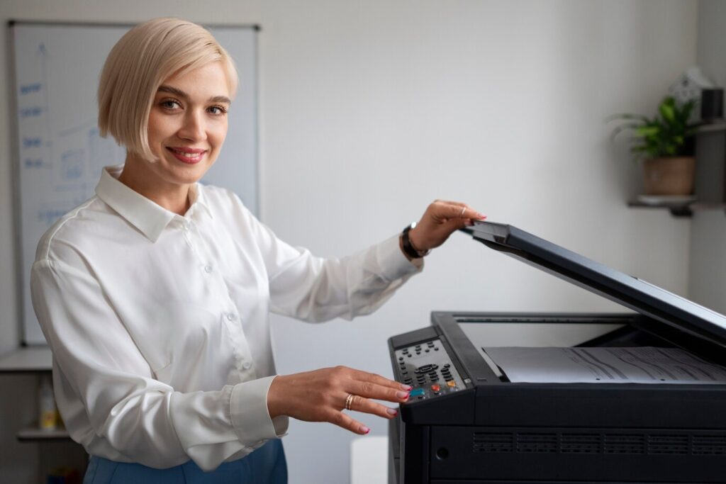 Office woman using printer supplied by Canon printer seller in Russia